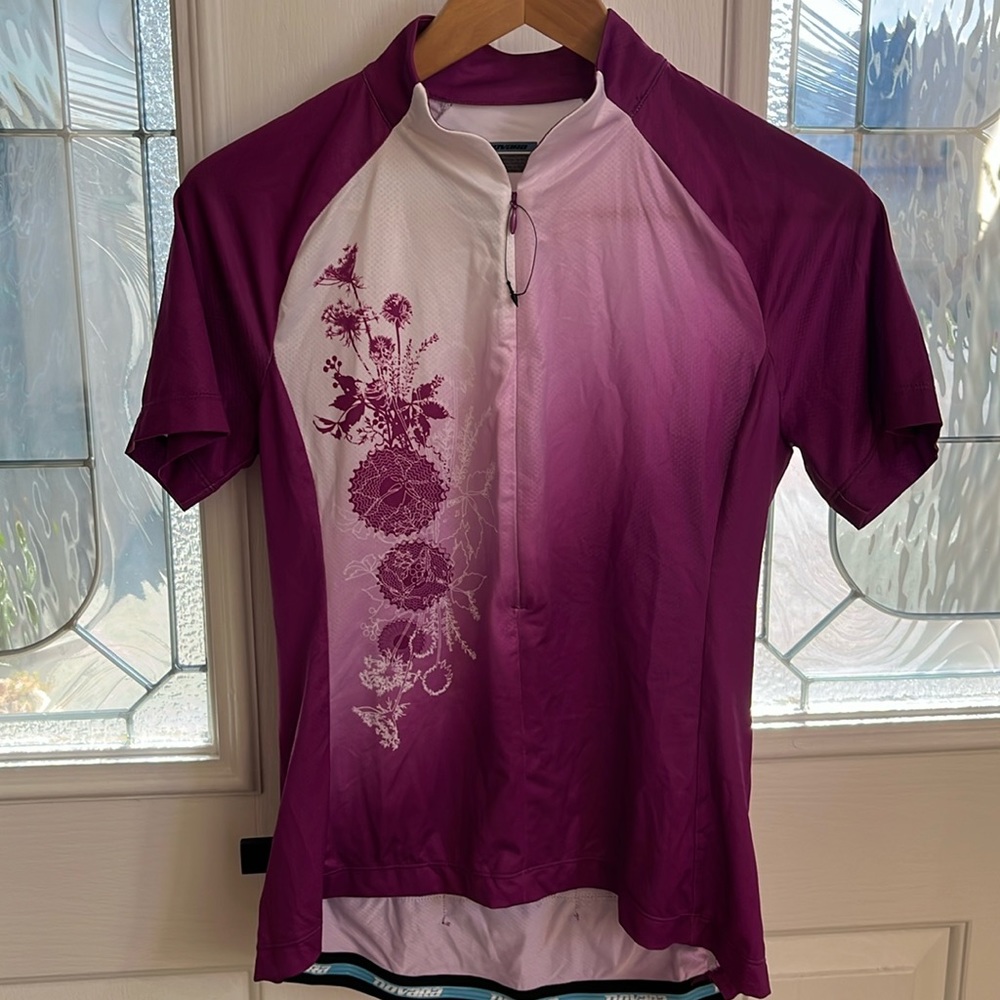 Novara Women cycling top. Size small. New without tag.
